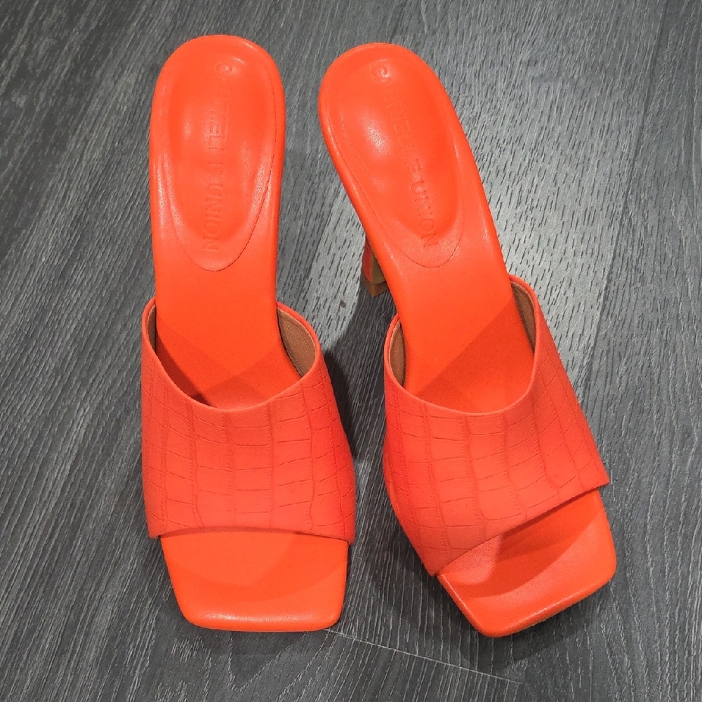 Gabrielle Union Chic Orange Croc-Embossed Mules